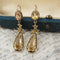 Boucles d'oreilles Pendants d'oreilles anciens citrines et émail noir 58 Facettes 19-609