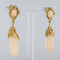 Boucles d'oreilles Boucles d'oreilles corail peau d'ange et or 58 Facettes 19-179