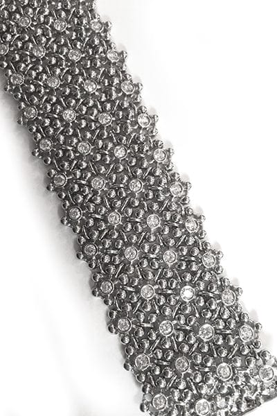Bracelet Bracelet manchette souple en or blanc, diamants. 58 Facettes 25540