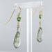 Boucles d'oreilles Boucles d'oreilles quartz à rutile grenats tsavorites et diamants 58 Facettes 18-352