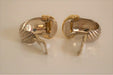 O.J PERRIN earrings Silver and gold gadroon earrings 58 Facettes 297
