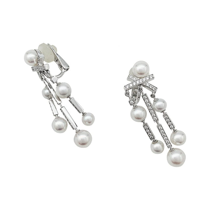 Earrings Chanel “Matelassé” model earrings in white gold, diamonds and pearls. 58 Facettes 29995