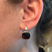 Earrings Pomellato “Sherazade” earrings in yellow and white gold, garnet and diamonds. 58 Facettes 27723
