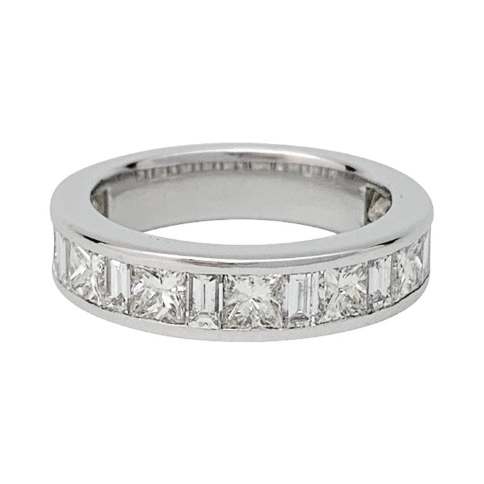 Half-round diamond wedding ring in white gold.