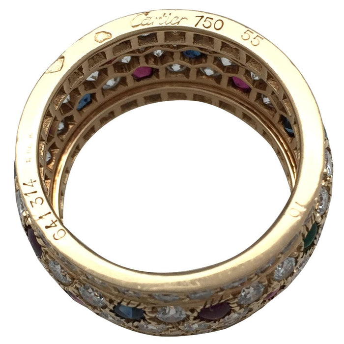 Bague 55 Bague Cartier, modèle Nigeria, en or jaune, diamants, rubis, saphirs et émeraudes. 58 Facettes 30384