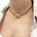 Cartier necklace in yellow gold, diamonds and yellow sapphire. 58 Facettes 30440