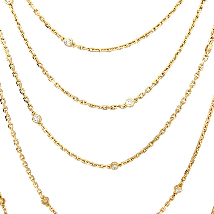 Boucheron long necklace, "Quatre Radiant", in yellow gold and diamonds.