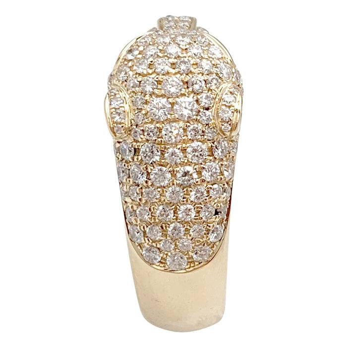Bague Cartier modèle "Panthère" en or jaune, onyx, émeraudes et diamants.