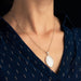 Old mother-of-pearl medal necklace and its chain with fine pearls 58 Facettes 20-318