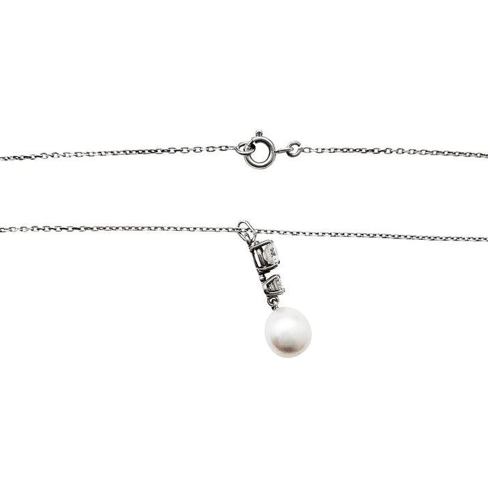 Collier Collier en or blanc diamants et perle. 58 Facettes 30296