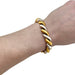 Bracelet Two-tone gold bracelet. 58 Facettes 29742
