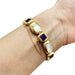 Van Cleef & Arpels “St Germain” bracelet in yellow gold, amethysts and mother-of-pearl. 58 Facettes 30289