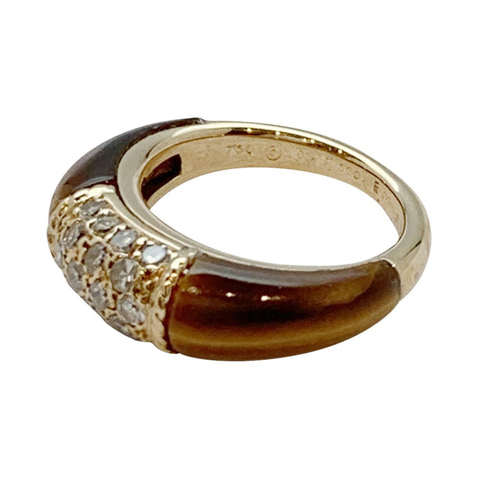Ring 51 Van Cleef and Arpels “Philippine” ring in yellow gold, tiger’s eye and diamonds. 58 Facettes 30045