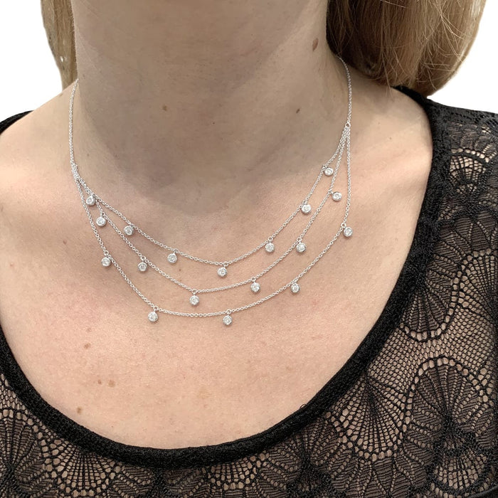 Drapery necklace in white gold and diamonds.