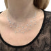 Necklace Drapery necklace in white gold and diamonds. 58 Facettes 29478