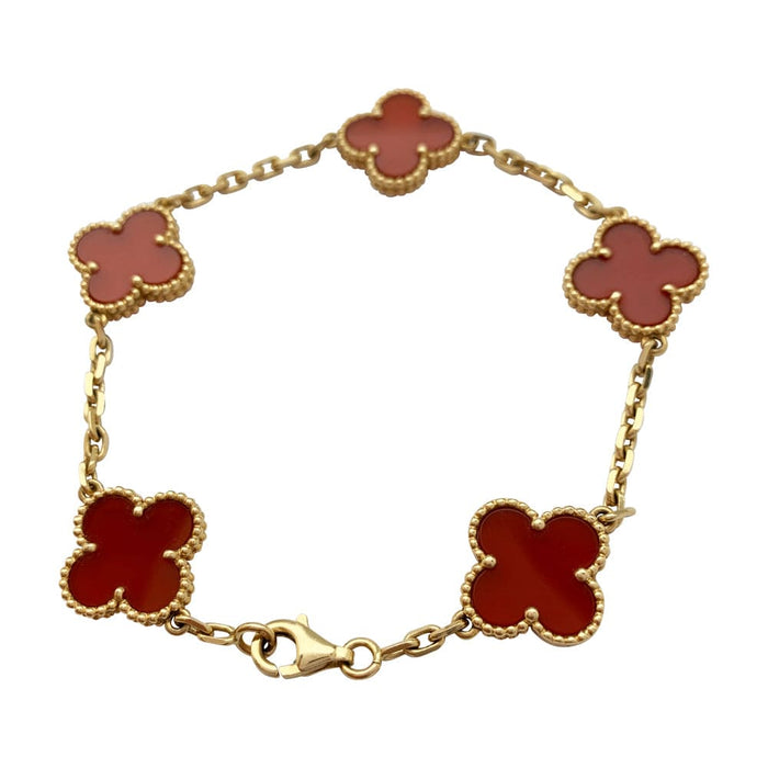 Van Cleef & Arpels "Vintage Alhambra" bracelet in yellow gold, carnelian.